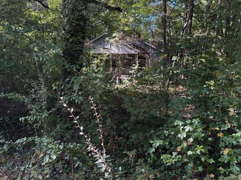 7125 Stillwell Road, Matthews, NC 28105.  MLS# CAR4308091, YatesRealty ID 790. Original 1900 home on property-do not enter