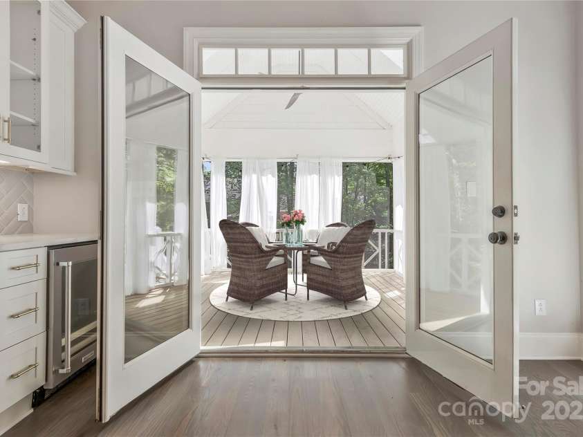 5538 Camelot Drive, Charlotte, NC 28270.  MLS# CAR4248094, YatesRealty ID 7900. Screened porch (virtually staged)