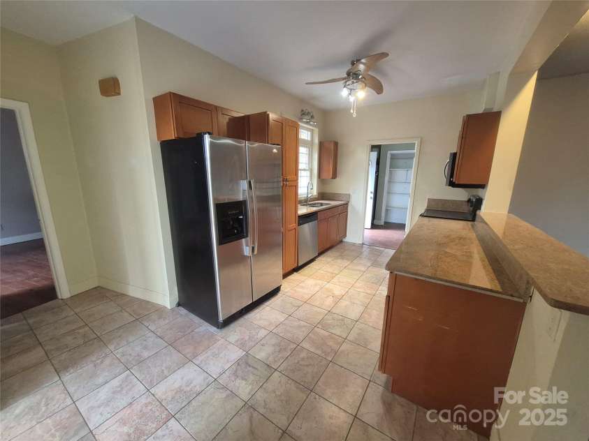 318 Vance Gap Road, Asheville, NC 28804.  MLS# CAR4231687, YatesRealty ID 7903. Kitchen with marble floor