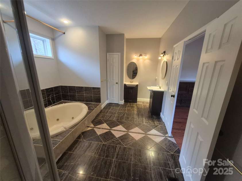 318 Vance Gap Road, Asheville, NC 28804.  MLS# CAR4231687, YatesRealty ID 7903. Left ba with marble floor