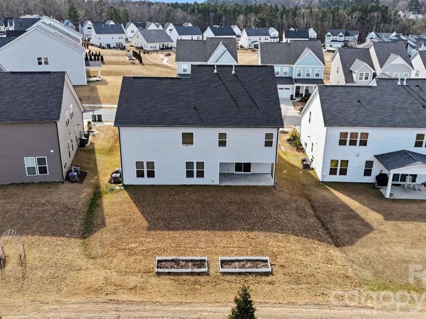 4266 Tournette Drive, Fort Mill, SC 29707.  MLS# CAR4338531, YatesRealty ID 7903. Aerial view of backyard