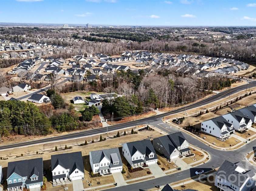 4266 Tournette Drive, Fort Mill, SC 29707.  MLS# CAR4338531, YatesRealty ID 7903. Aerial view of community