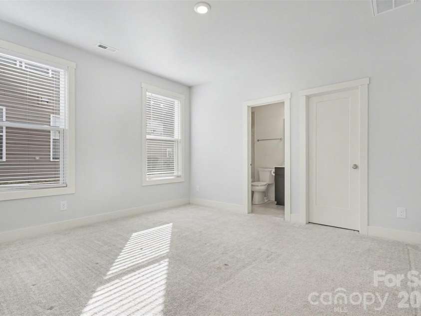 4266 Tournette Drive, Fort Mill, SC 29707.  MLS# CAR4338531, YatesRealty ID 7903. Main level bedroom suite