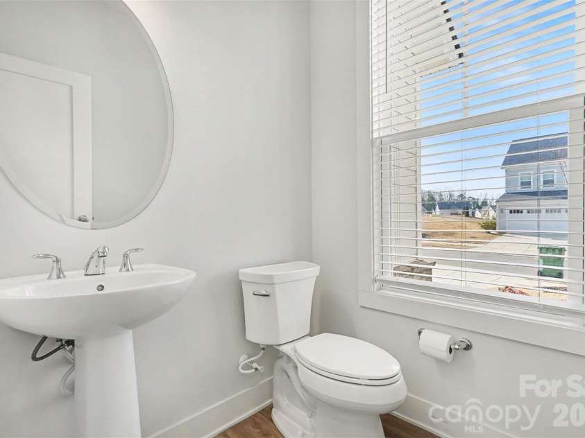 4266 Tournette Drive, Fort Mill, SC 29707.  MLS# CAR4338531, YatesRealty ID 7903. Main level half bath