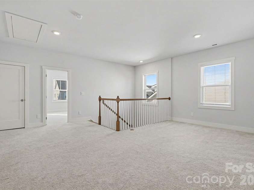 4266 Tournette Drive, Fort Mill, SC 29707.  MLS# CAR4338531, YatesRealty ID 7903. Upstairs loft landing