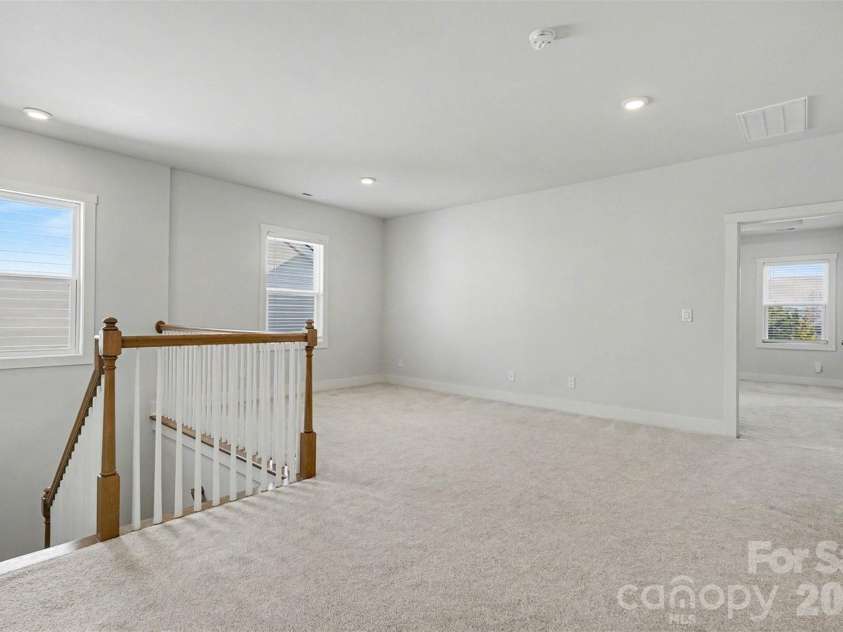 4266 Tournette Drive, Fort Mill, SC 29707.  MLS# CAR4338531, YatesRealty ID 7903. Upstairs loft landing