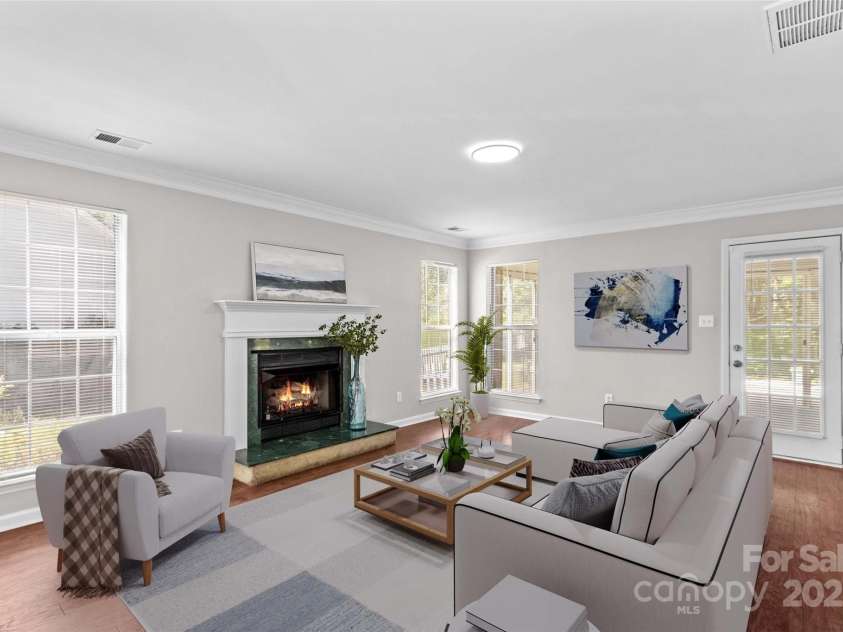 1807 Sugar Hollow Drive, Charlotte, NC 28214.  MLS# CAR4247073, YatesRealty ID 7904. Living Room Virtually Staged