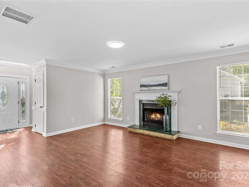1807 Sugar Hollow Drive, Charlotte, NC 28214.  MLS# CAR4247073, YatesRealty ID 7904. Living Room with fireplace