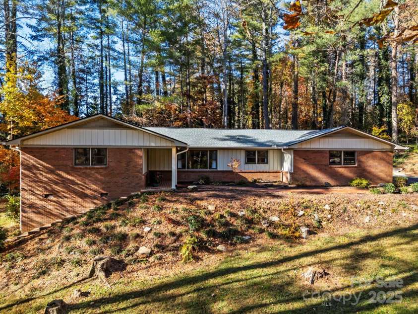 228 Raintree Drive, Hendersonville, NC 28791.  MLS# CAR4318533, YatesRealty ID 7904. 