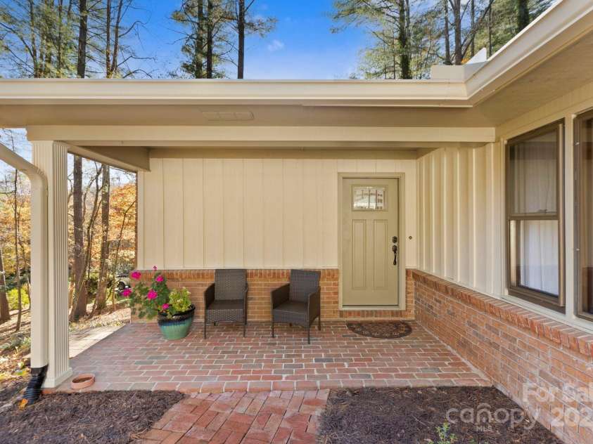 228 Raintree Drive, Hendersonville, NC 28791.  MLS# CAR4318533, YatesRealty ID 7904. Charming entry