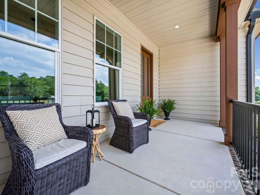 121 Juniper Road, Mooresville, NC 28115.  MLS# CAR4403335, YatesRealty ID 7912. Covered Front Porch
