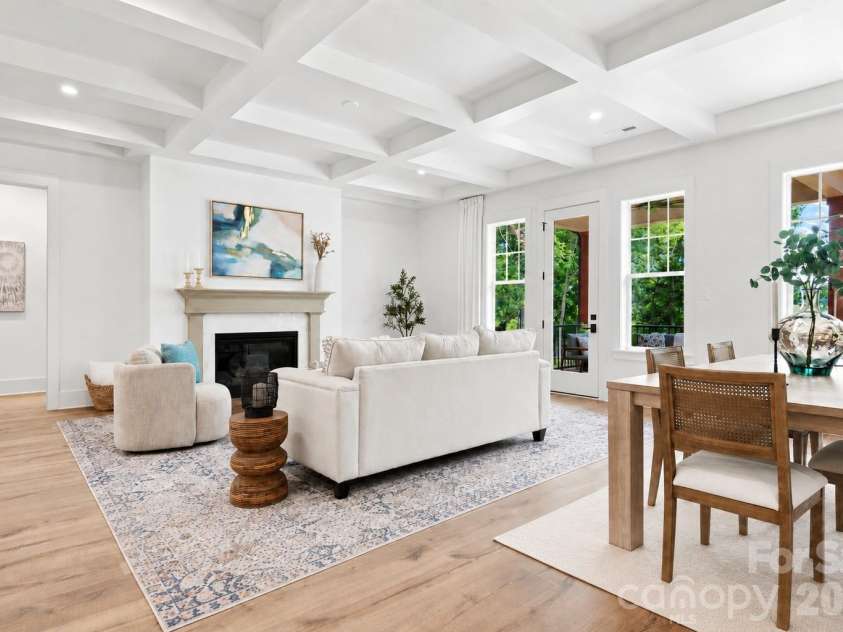 121 Juniper Road, Mooresville, NC 28115.  MLS# CAR4403335, YatesRealty ID 7912. Living Room/Dining Room w/ Coffered Ceiling
