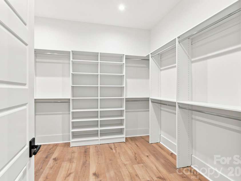 121 Juniper Road, Mooresville, NC 28115.  MLS# CAR4403335, YatesRealty ID 7912. Primary Custom Walk-in Closet