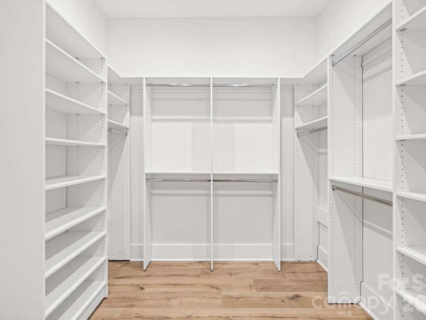 121 Juniper Road, Mooresville, NC 28115.  MLS# CAR4403335, YatesRealty ID 7912. Primary Custom Walk-in Closet