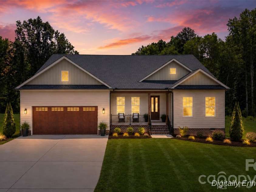 121 Juniper Road, Mooresville, NC 28115.  MLS# CAR4403335, YatesRealty ID 7912. Twilight Photo Digitally Enhanced