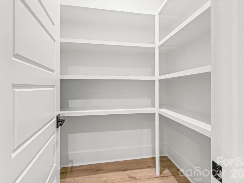 121 Juniper Road, Mooresville, NC 28115.  MLS# CAR4403335, YatesRealty ID 7912. Walk-in Pantry