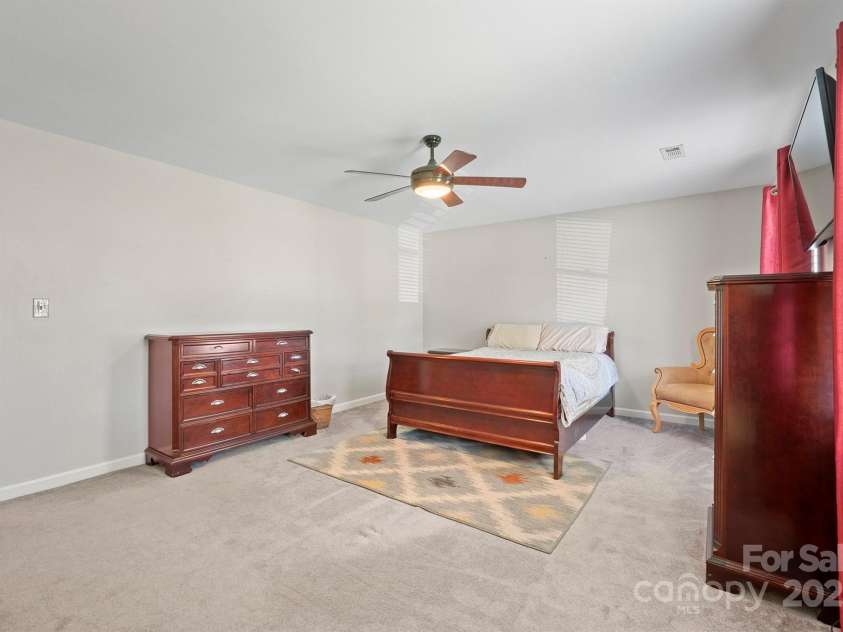 16417 Grapperhall Drive, Huntersville, NC 28078.  MLS# CAR4234570, YatesRealty ID 7913. Primary bedroom