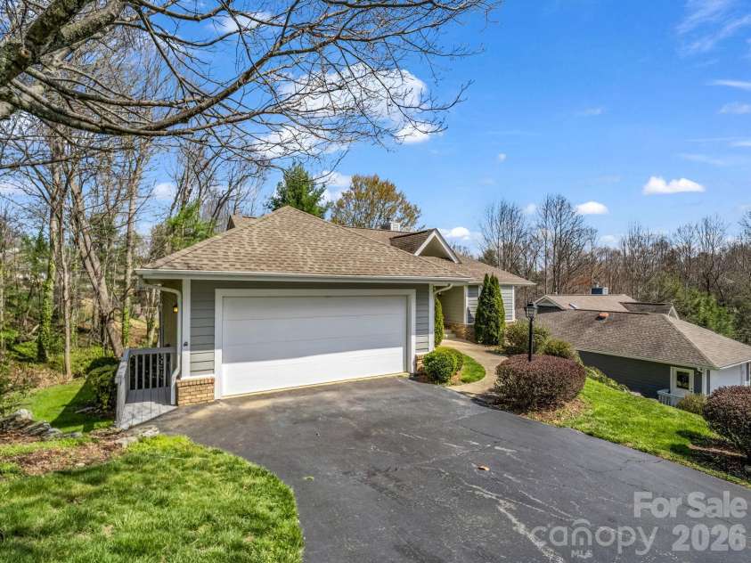 111 Broadmoor Drive, Flat Rock, NC 28731.  MLS# CAR4358626, YatesRealty ID 7915. Double garage with opener