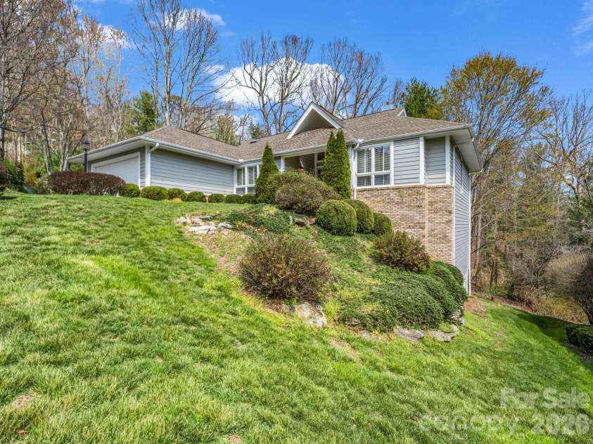 111 Broadmoor Drive, Flat Rock, NC 28731.  MLS# CAR4358626, YatesRealty ID 7915. Front View from street