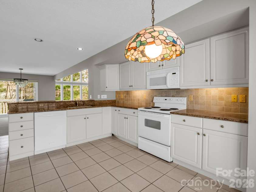 111 Broadmoor Drive, Flat Rock, NC 28731.  MLS# CAR4358626, YatesRealty ID 7915. Oodles of cabinets