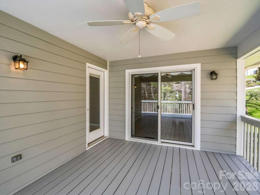 111 Broadmoor Drive, Flat Rock, NC 28731.  MLS# CAR4358626, YatesRealty ID 7915. Perfect spot for relaxing or dining al fresco!
