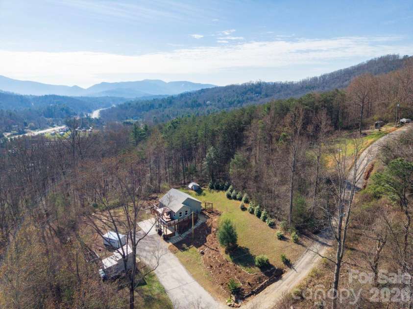132 Peaceful View Drive, Fairview, NC 28730.  MLS# CAR4363151, YatesRealty ID 7917. Aerial approach property view
