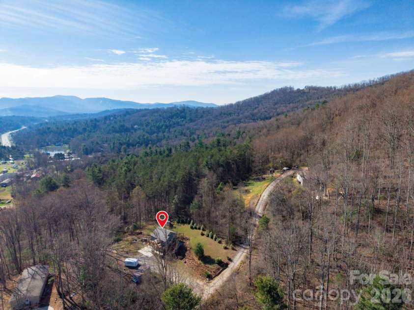 132 Peaceful View Drive, Fairview, NC 28730.  MLS# CAR4363151, YatesRealty ID 7917. Aerial approach property view