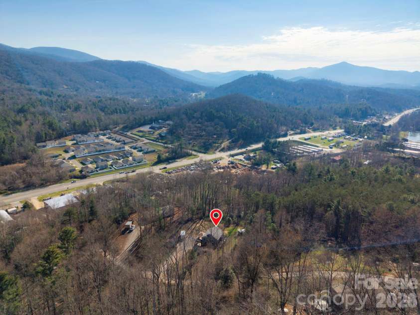 132 Peaceful View Drive, Fairview, NC 28730.  MLS# CAR4363151, YatesRealty ID 7917. Aerial neighborhood context view