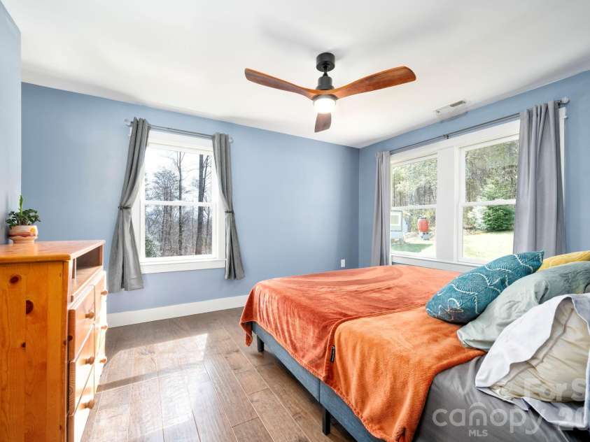132 Peaceful View Drive, Fairview, NC 28730.  MLS# CAR4363151, YatesRealty ID 7917. Bedroom mountain view windows