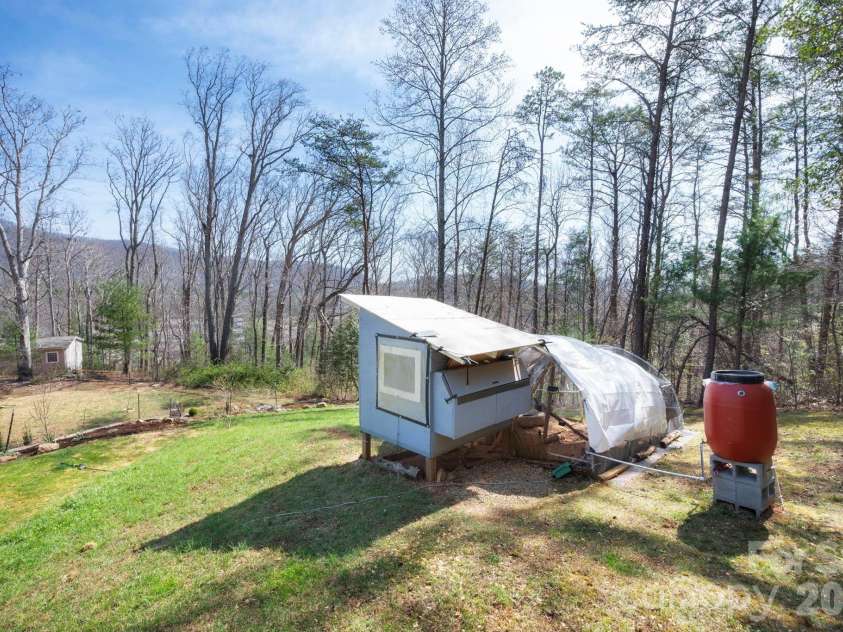132 Peaceful View Drive, Fairview, NC 28730.  MLS# CAR4363151, YatesRealty ID 7917. Chicken coop greenhouse area