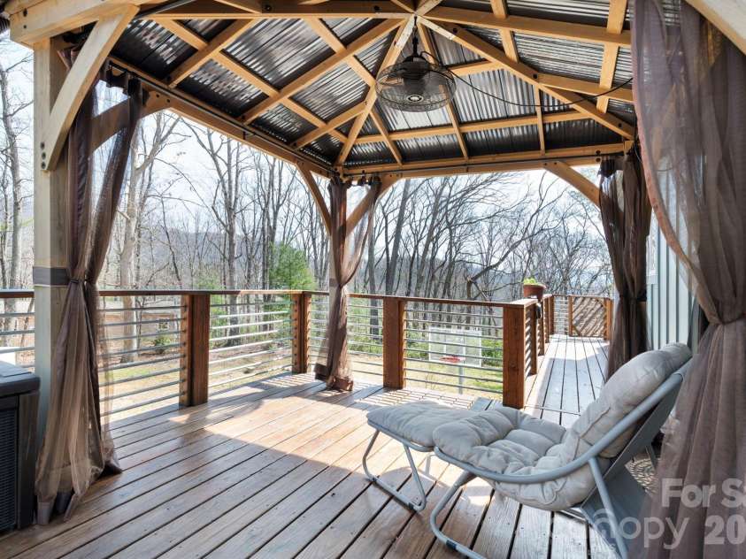 132 Peaceful View Drive, Fairview, NC 28730.  MLS# CAR4363151, YatesRealty ID 7917. Covered deck lounge gazebo