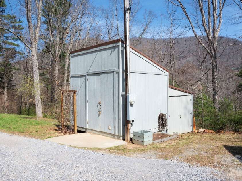 132 Peaceful View Drive, Fairview, NC 28730.  MLS# CAR4363151, YatesRealty ID 7917. Detached storage shed with electricity
