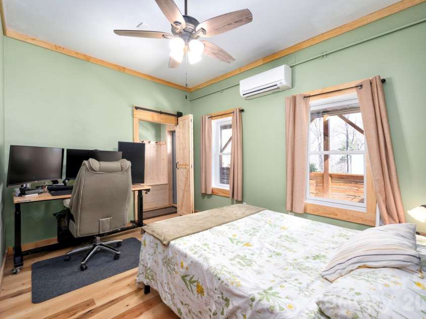 132 Peaceful View Drive, Fairview, NC 28730.  MLS# CAR4363151, YatesRealty ID 7917. Lower level bedroom guest suite