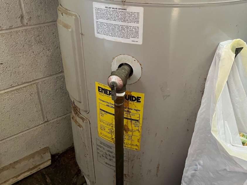 579 Lakey Gap Road, Black Mountain, NC 28711.  MLS# CAR4341630, YatesRealty ID 7918. Water heater in kitchen