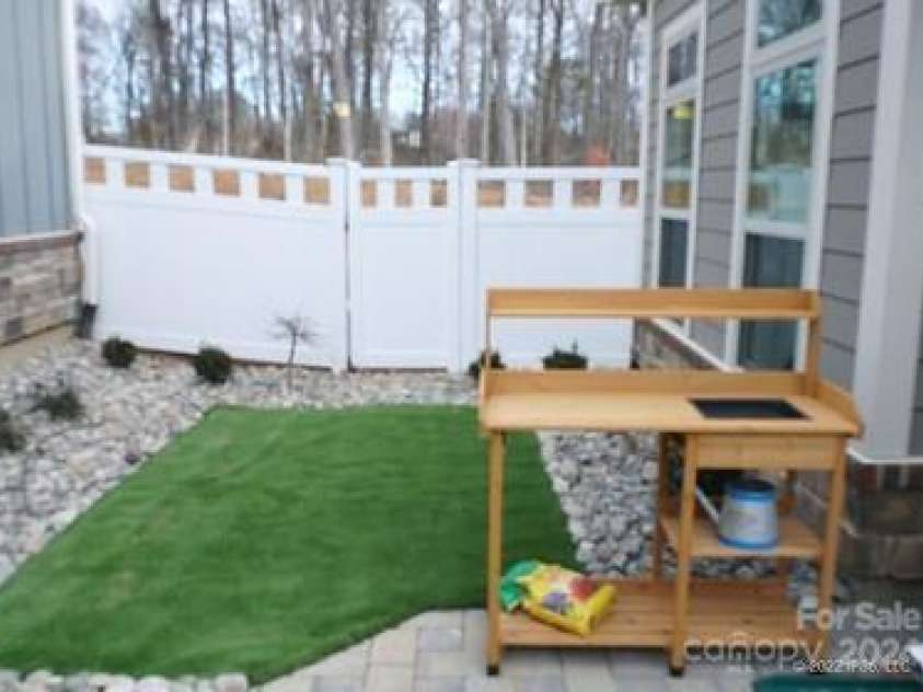 1055 Millview Lane, Stallings, NC 28104.  MLS# CAR4113607, YatesRealty ID 7920. Courtyard Pet Turf