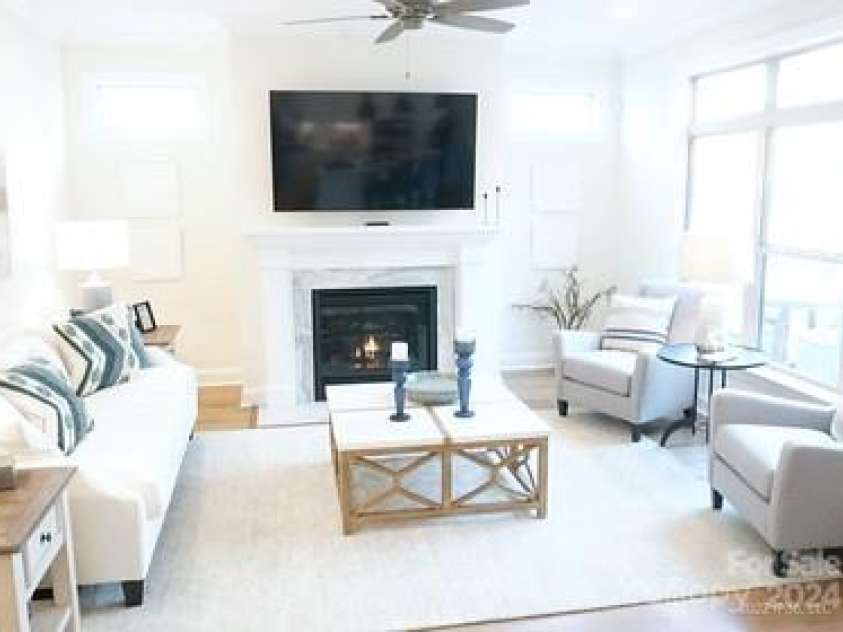 1055 Millview Lane, Stallings, NC 28104.  MLS# CAR4113607, YatesRealty ID 7920. Living room view from Kitchen