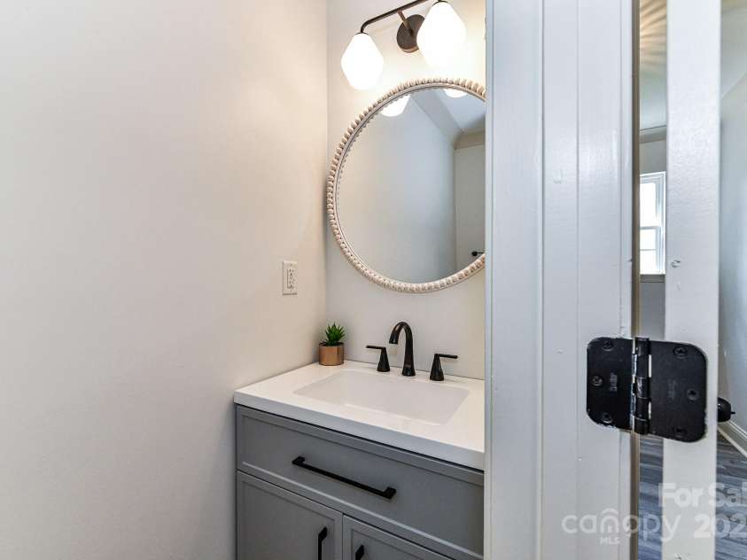 112 Denham Place, Mooresville, NC 28115.  MLS# CAR4237866, YatesRealty ID 7931. Half Bath on main!