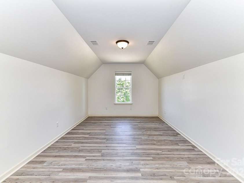 112 Denham Place, Mooresville, NC 28115.  MLS# CAR4237866, YatesRealty ID 7931. Sitting Area in Primary Suite!