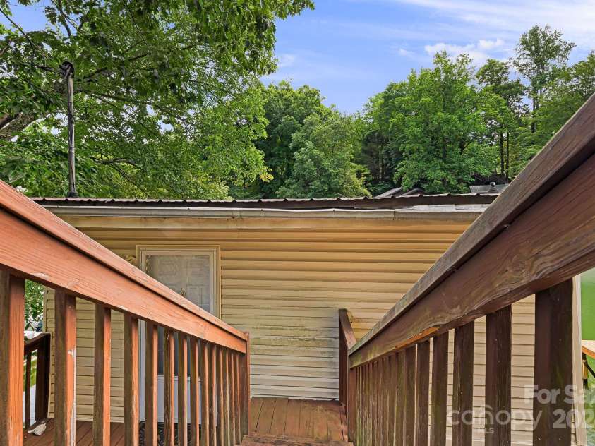 2100 Memorial Highway, Lake Lure, NC 28746.  MLS# CAR4174635, YatesRealty ID 7933. 