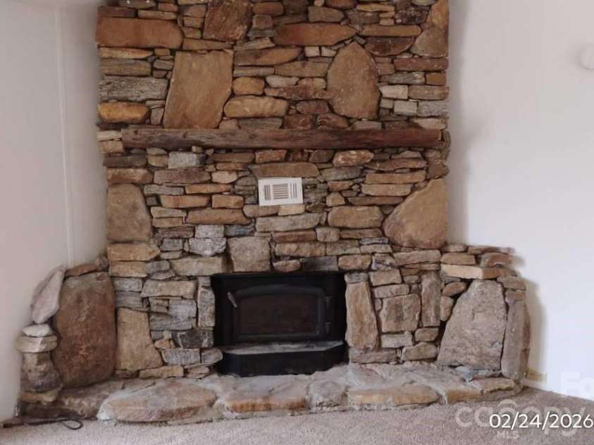 115 Paradise Mountain Road, Canton, NC 28716.  MLS# CAR4350183, YatesRealty ID 7935. Fireplace