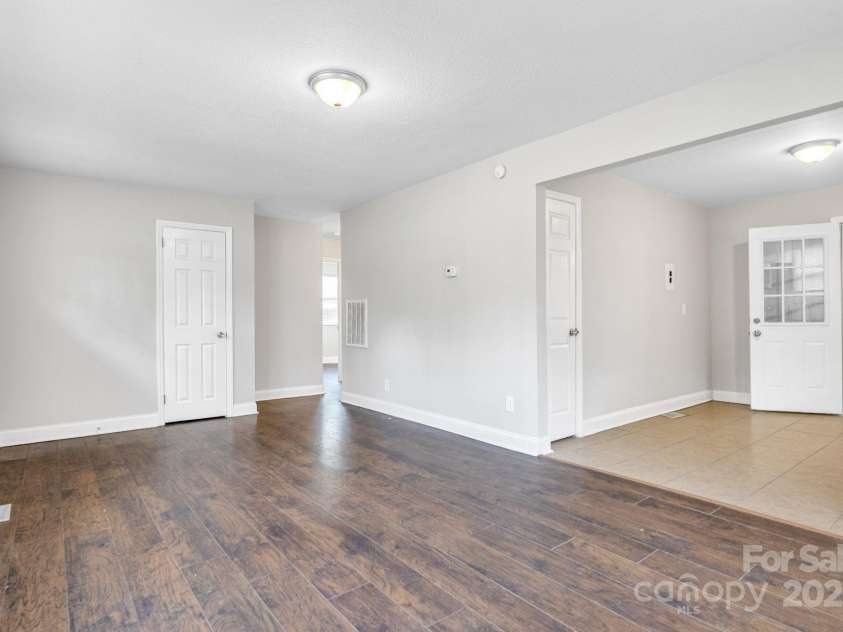 2815 Grimes Street, Charlotte, NC 28206.  MLS# CAR4244081, YatesRealty ID 7935. Living room, immediately walking in from front door.