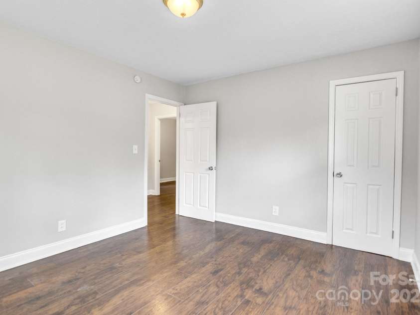 2815 Grimes Street, Charlotte, NC 28206.  MLS# CAR4244081, YatesRealty ID 7935. Primary bedroom, facing entry door.
