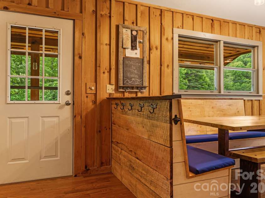 3245 Puncheon Fork Road, Mars Hill, NC 28754.  MLS# CAR4345903, YatesRealty ID 7943. Entry door/Dining Area