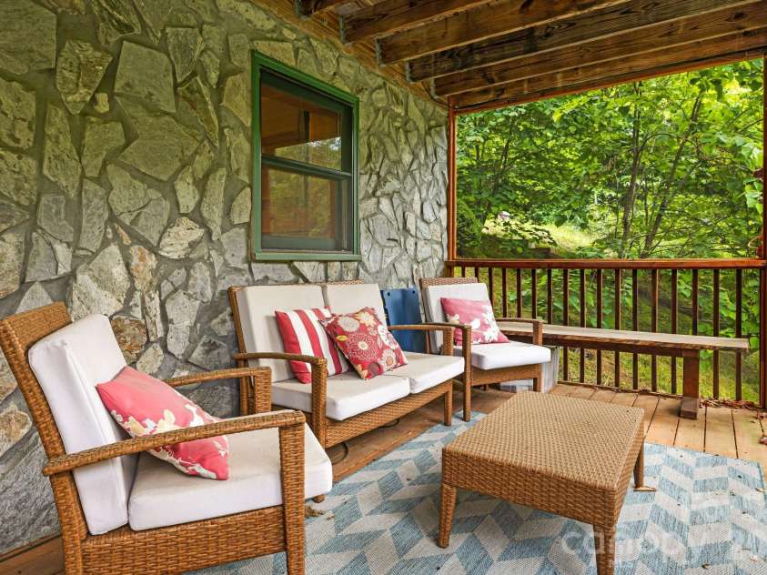 3245 Puncheon Fork Road, Mars Hill, NC 28754.  MLS# CAR4345903, YatesRealty ID 7943. Screened Porch Lower Level