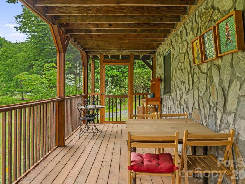 3245 Puncheon Fork Road, Mars Hill, NC 28754.  MLS# CAR4345903, YatesRealty ID 7943. Screened Porch Lower Level