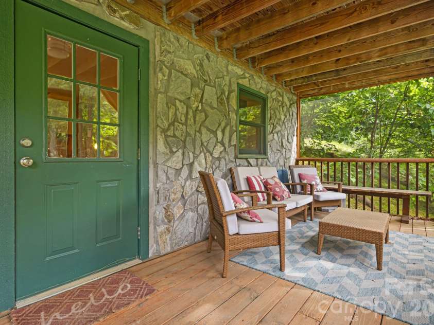 3245 Puncheon Fork Road, Mars Hill, NC 28754.  MLS# CAR4345903, YatesRealty ID 7943. Screened Porch Lower Level