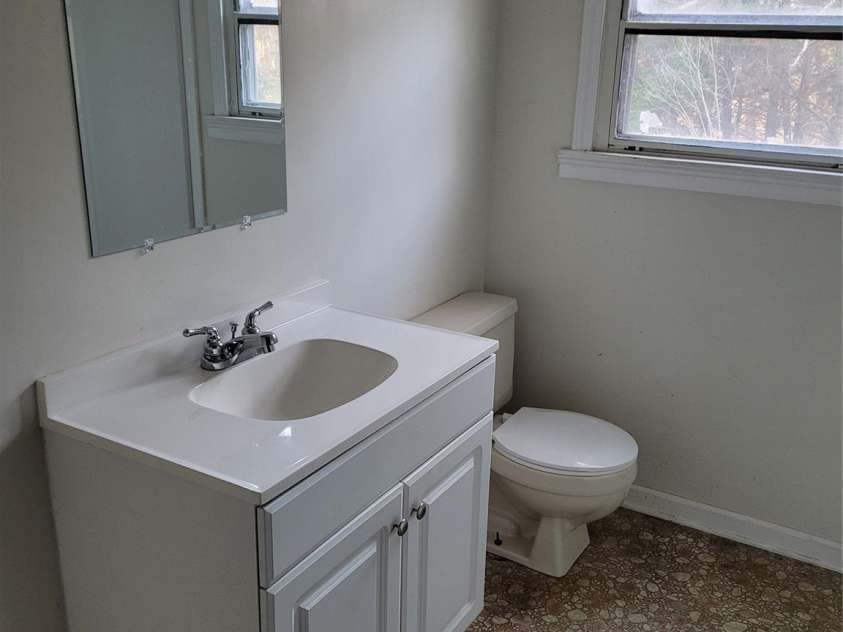 4161 Slanting Bridge Road, Sherrills Ford, NC 28673.  MLS# CAR4221481, YatesRealty ID 7947. Guest bathroom with new sink and cabinet