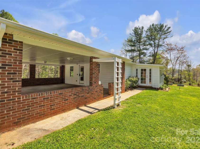 1975 Old Wilkesboro Road, Taylorsville, NC 28681.  MLS# CAR4243229, YatesRealty ID 7948. Backyard