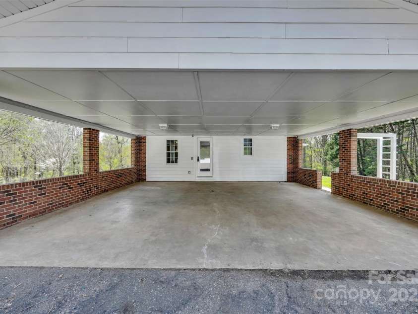 1975 Old Wilkesboro Road, Taylorsville, NC 28681.  MLS# CAR4243229, YatesRealty ID 7948. Carport