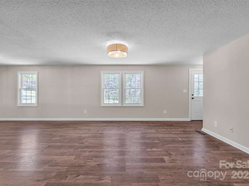 1975 Old Wilkesboro Road, Taylorsville, NC 28681.  MLS# CAR4243229, YatesRealty ID 7948. Dining/Family